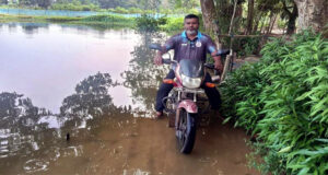 রাস্তা জলাবদ্ধতায় থমকে গেছে আট গ্রামের জীবনযাত্রা